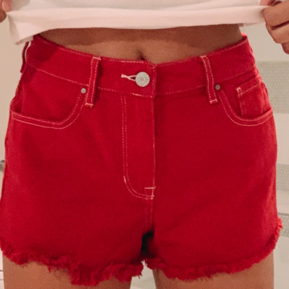 Red jean shorts.